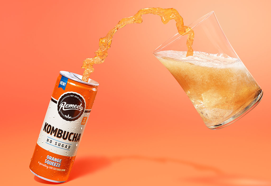 Remedy Kombucha Orange Splash pouring image