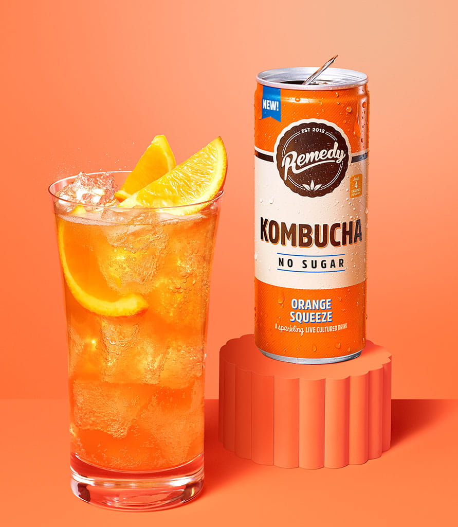 Remedy Kombucha Orange Splash with glass Lifestyle